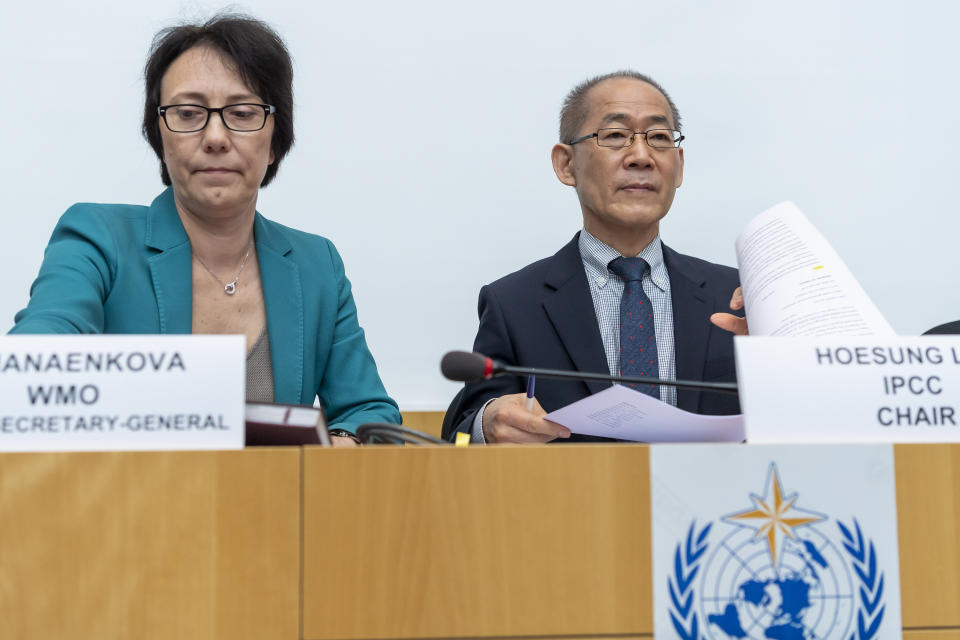 Elena Manaenkova, left, WMO Deputy Secretary-General and Hoesung Lee, right, chair of the United Nations Intergovernmental Panel on Climate Change (IPCC) speak during a news conference on the Special Report on Climate Change and Land after IPCC's 50th session in Geneva, Switzerland, Thursday, Aug. 8, 2019. (Martial Trezzini/Keystone via AP)