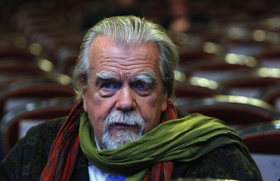 FILE - In this Feb.25, 2011 file photo , French actor Michael Lonsdale, awarded for the Supporting Actor, attends prior to the annual Cesar 36th Awards ceremony, in Paris. Michael Lonsdale, a French-British actor and giant of the silver screen and theatre in France, died on Monday, his agent said. From his role as villain in the 1979 James Bond film "Moonraker" to that of a monk in Algeria in "Of Gods and Men," Lonsdale worked, often in second roles, with top directors from Orson Wells to Spielberg. (AP Photo/Jacques Brinon, File)