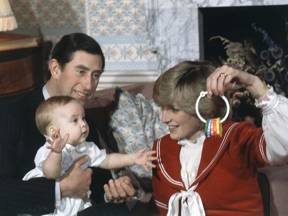 Britain's Prince William, the 6-month old son of British Prince Charles and Princess Diana, the Prince and Princess of Wales with his parents during a special picture call at Kensington Palace in London, England on Dec. 22, 1982.