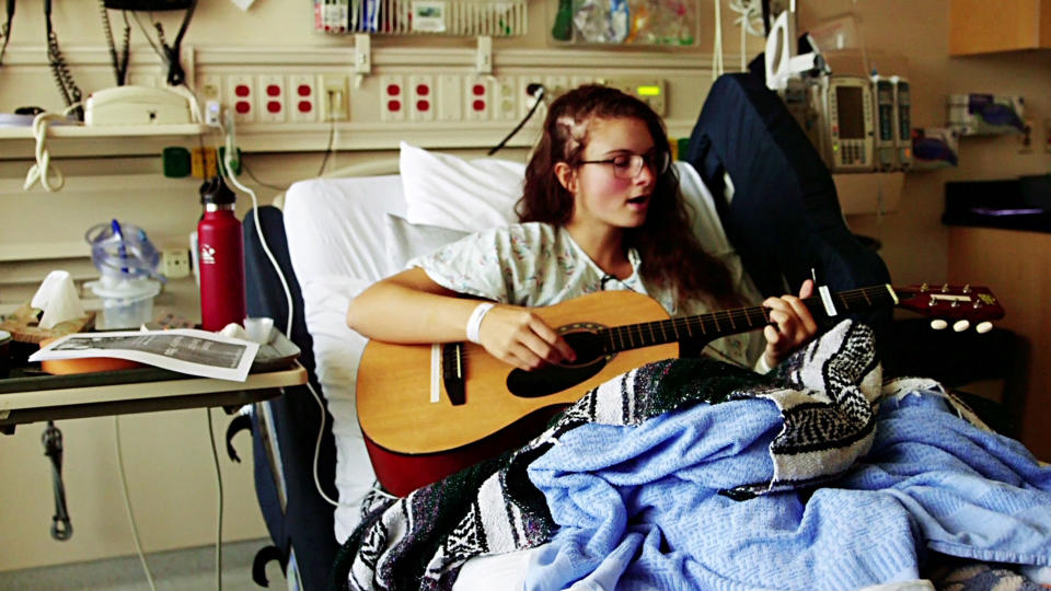 Kira Laconetti was singing in her hospital bed 48 hours after her surgery. Source: Caters