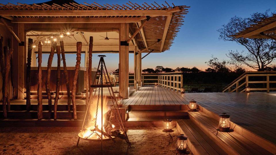 A fire-lit terrace at Belmond Savute Elephant Lodge, voted one of the best hotels in the world