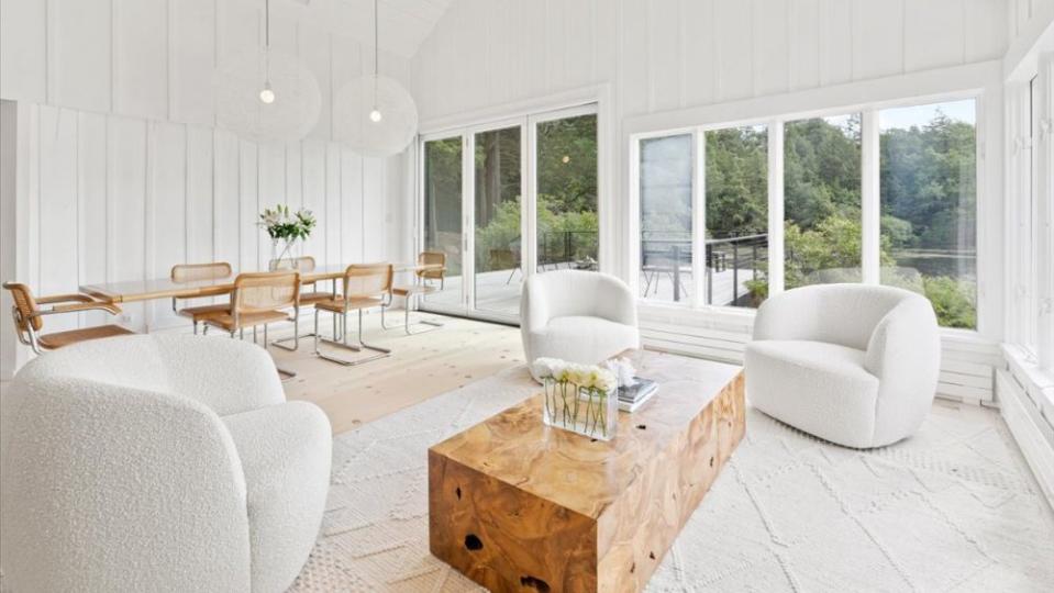 The light-filled living room in the main house - Credit: Mark Davidson