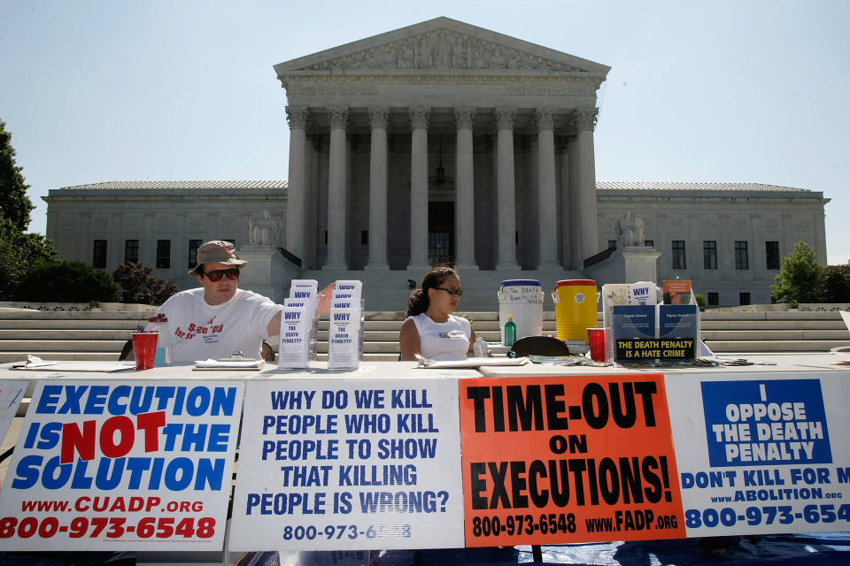 Anti-death-penalty activists protest outside the Supreme Court, July 1, 2008