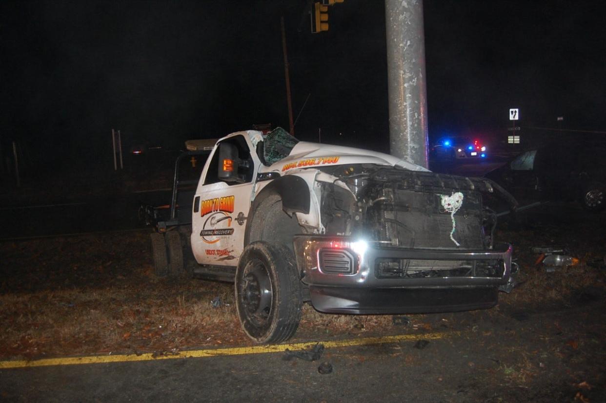 This photo shows a tow truck that collided with a traffic-signal pole early Tuesday, Jan. 31, 2023 on the George Washington Memorial Highway in Gloucester County. The driver, 28-year-old Marquise Tashawn Haskins, was killed in the crash.