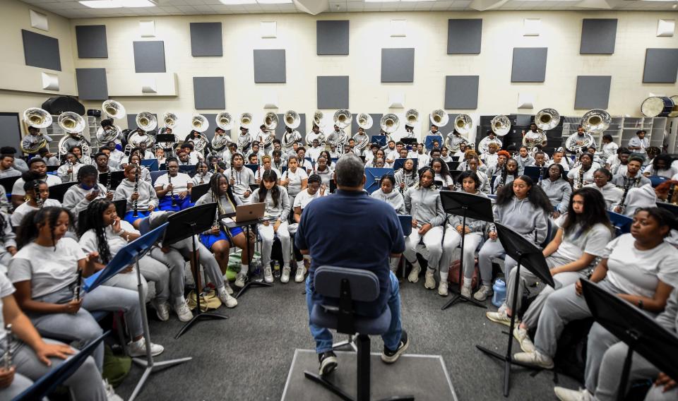 The marching band gather together inside the TSU Performing Arts Center in Nashville, Tenn., Tuesday, Oct. 4, 2022. 