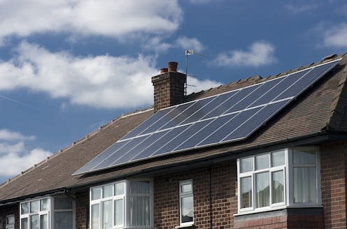 <span class="caption">A cooperative in southern England installed solar panels on flats and used the revenue to fund energy-efficient improvements.</span> <span class="attribution"><a class="link " href="https://www.shutterstock.com/image-photo/roof-mounted-solar-panels-manchester-england-394391113" rel="nofollow noopener" target="_blank" data-ylk="slk:Marcin Wos/Shutterstock;elm:context_link;itc:0;sec:content-canvas">Marcin Wos/Shutterstock</a></span>