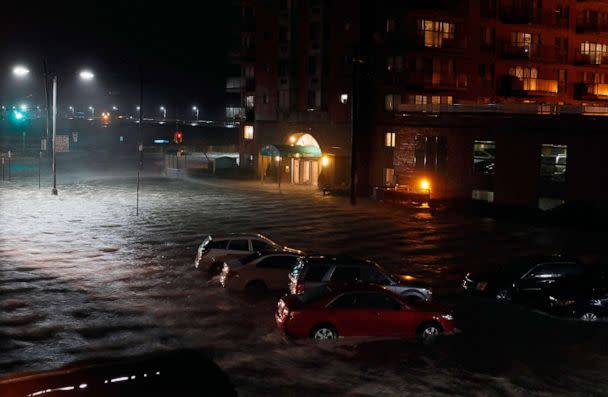 PHOTO: FILE - Flood water runs down West Broadway engulfing parked cars during Hurricane Sandy, Oct. 30, 2012 in Long Beach, New York. (Mike Stobe/Getty Images, FILE)