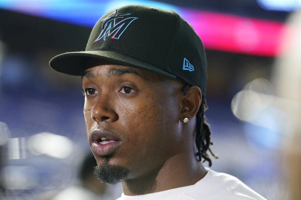 Miami Marlins baseball infielder Jean Segura talks with the news media, Wednesday, Jan. 11, 2023, in Miami. Segura recently signed a two-year deal with the Marlins. (AP Photo/Lynne Sladky)