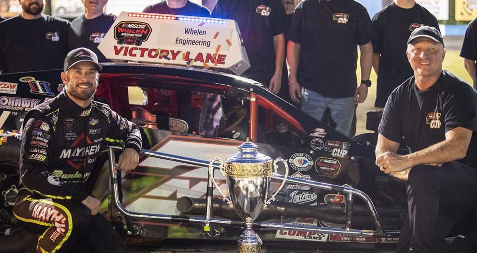 Doug Coby, driver of the #7 Mayhew Tools Modified Car celebrates his Whelen Granite State Short Track Cup Championship during the Winchester Fair for the NASCAR Whelen Modified Tour at Monadnock Speedway in Winchester, New Hampshire on September 9, 2023. (Armond Feffer/NASCAR)