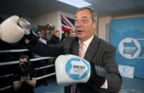 Brexit Party leader Nigel Farage, reacts, during a party rally, as part of General Election campaign trail, in Ilford, Essex, England, Wednesday, Nov. 13,2019. Britain goes to the polls on Dec. 12. (Joe Giddens/PA via AP)