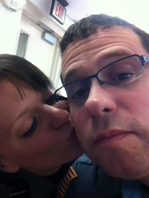 Susan Reeves kisses her husband, Chris Reeves. He was killed during a pursuit in 2012.