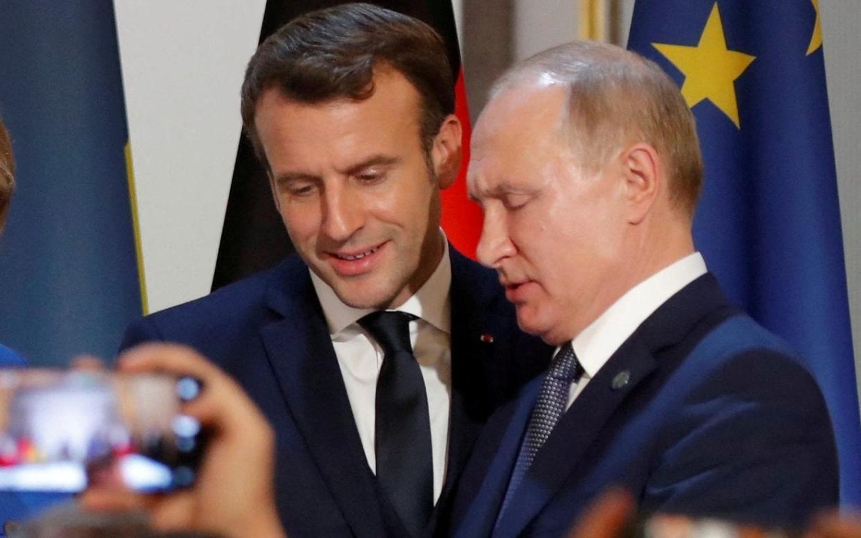 Macron and Putin - REUTERS