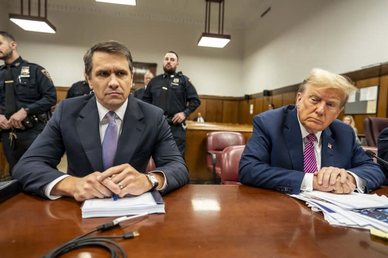 Former President Donald Trump sits in the courtroom at Manhattan Criminal Court in New York on Friday. Trump is facing 34 felony criminal charges alleging he falsified business records to cover up a sex scandal during the 2016 campaign. Pool photo by Mark Peterson/UPI