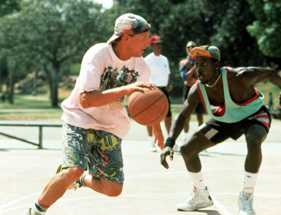 Woody Harrelson dribbling towards Wesley Snipes