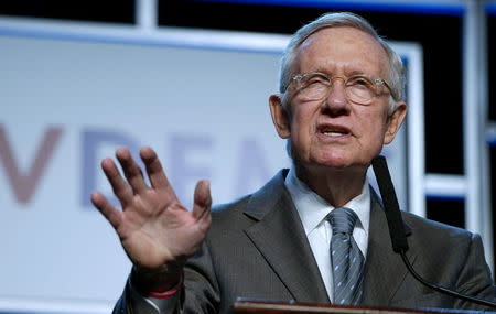 Sen. Harry Reid (D-NV) speaks at a Democratic fundraising dinner featuring all three Democratic presidential candidates in Las Vegas, Nevada, January 6, 2016. REUTERS/Rick Wilking