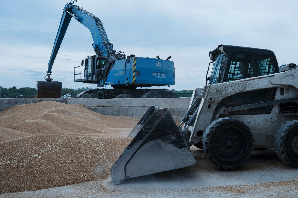 Excavators work at a grain port in Izmail, Ukraine, Wednesday (Copyright 2023 The Associated Press. All rights reserved)