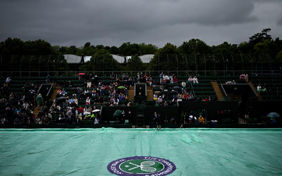 Wimbledon day two: Rains stops play with Dart and Jubb ahead in their matches