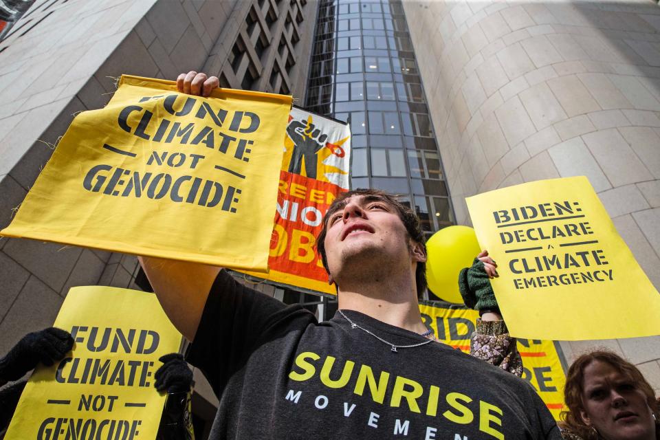 Youth from the Sunrise Movement participate in a climate protest outside of President Joe Biden's 2024 campaign headquarters in Wilmington, Monday, February 12, 2024.