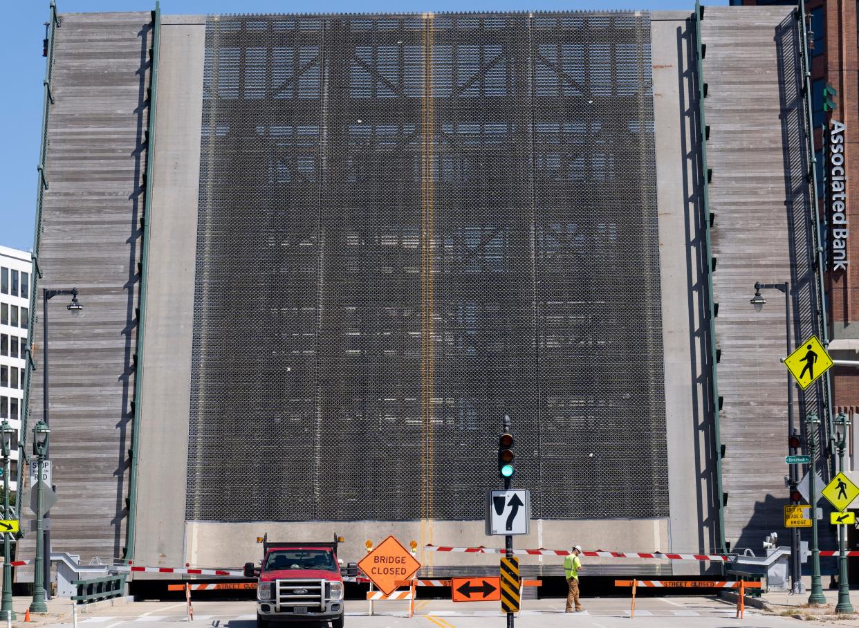 Workers from Zenith Tech work on the Kilbourn Avenue bridge over the Milwaukee River on Wednesday, September 7, 2022, in Milwaukee. A Rhode Island man fell 71 feet to his death from the downtown Milwaukee bridge as it opened on Aug. 15.