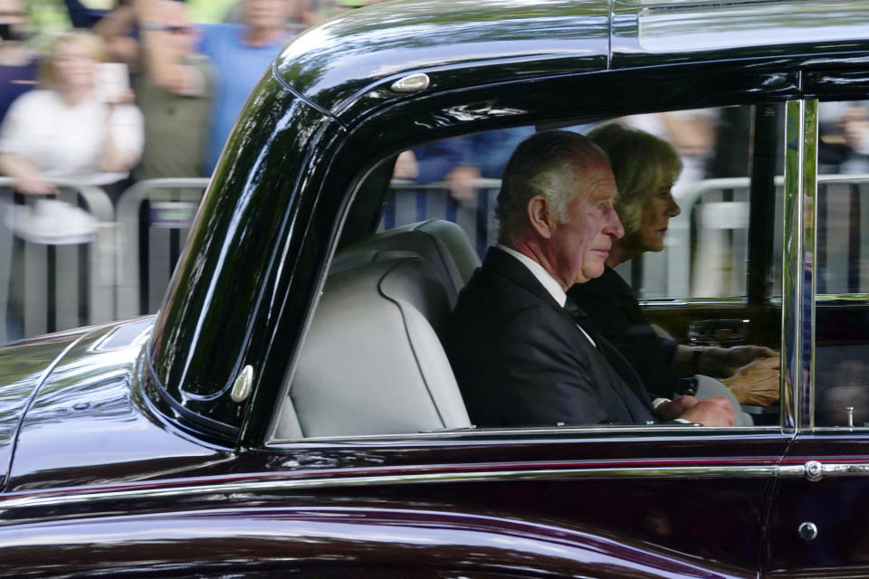 Britain's King Charles III and Camilla, the Queen Consort, arrive at Buckingham Palace after traveling from Balmoral following the death of Queen Elizabeth II on Thursday, in London, Friday, September 9, 2022. (Victoria Jones/PA via AP)