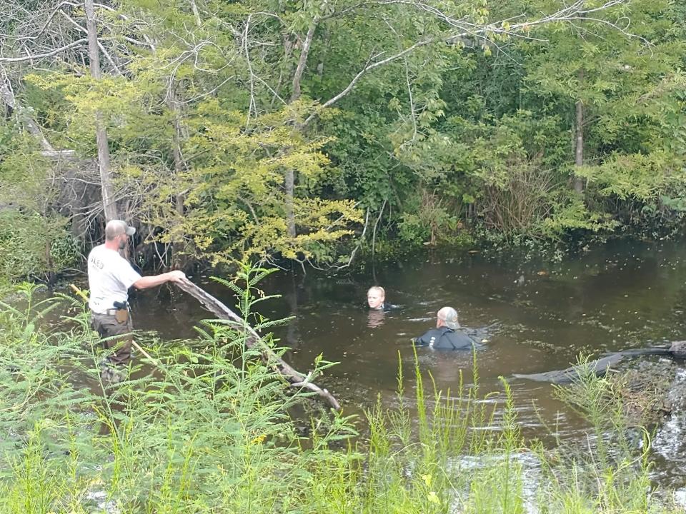 SLED teams in the water.