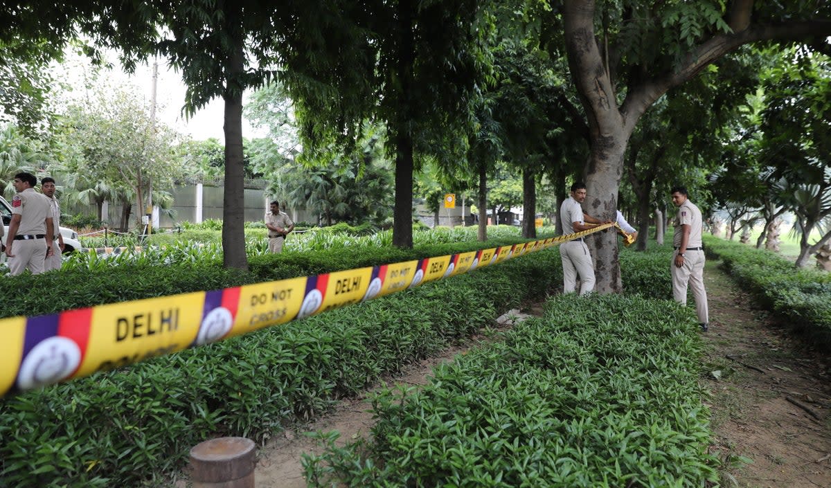 Indian policemen secure the premises around the Canadian embassy in New Delhi on 19 September (EPA)