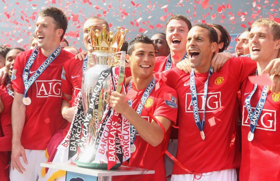 Manchester United's Cristiano Ronaldo celebrates with the Premier League trophy in 2009 (Man Utd via Getty Images)