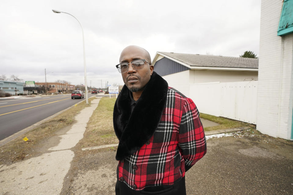 Brian Chaney stands near the area, Wednesday, Jan. 10, 2024, in Keego Harbor, Mich., where he was arrested. The officer told Chaney he thought Chaney was breaking into cars and cuffed him. Chaney, who is Black, asked for a supervisor. The white officer told pointed to another officer from a different police department and told Chaney he was the supervisor. The Keego Harbor chief said in a deposition in a lawsuit Chaney filed that it's ok for his officers to lie when they are not under oath. (AP Photo/Carlos Osorio)