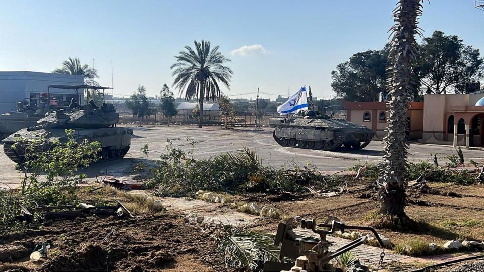 PHOTO: This handout picture released by the Israeli army shows the 401st Brigade's combat team tanks entering the Palestinian side of the Rafah border crossing between Gaza and Egypt in the southern Gaza Strip, on May 7, 2024.  (Israeli Army/AFP via Getty Image)