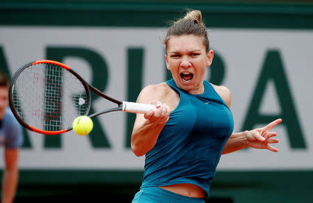 Tennis - French Open - Roland Garros, Paris, France - May 30, 2018 Romania's Simona Halep in action during her first round match against Alison Riske of the U.S. REUTERS/Pascal Rossignol