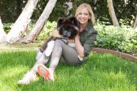 <p>Saraah Michelle Gellar gets snuggly with her pup, Kumi, at a park on Wednesday in L.A. </p>
