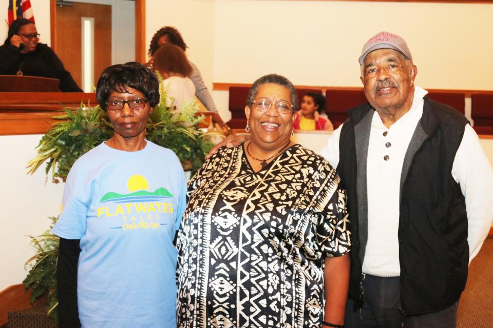 Oak Valley Baptist Church in Oak Ridge's Scarboro community provides the setting for a photo of storyteller Sheila Arnold, center, and two of the Scarboro 85 who desegregated Oak Ridge schools in 1955. At left is Emma McCaskill, who was a sixth grader in 1955 and attended Robertsville Junior High. At right is L.C. "Larry" Gipson, who went to Oak Ridge High School.