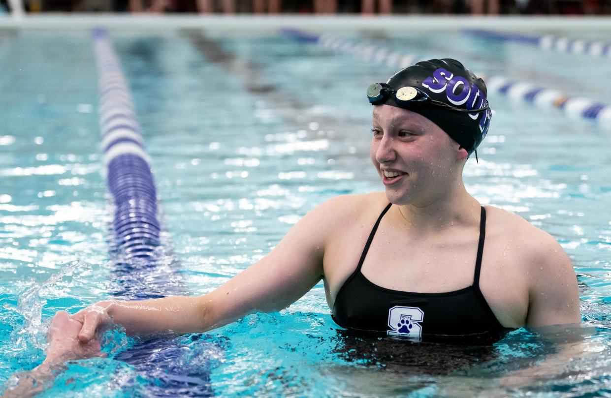 South's Lucy Tait celebrates following the Girl's 50 Yard Freestyle race during the 2024 Counsilman Classic Swimming & Diving Meet between the Bloomington North Cougars and Bloomington South Panthers at Bloomington High School South Natatorium on January 13, 2024