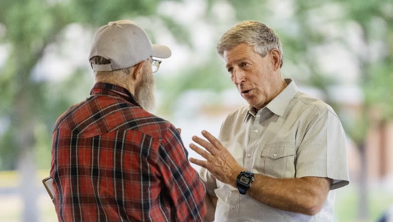 Utah 2nd Congressional District candidate Bruce Hough talks with Ron Mortensen at a gathering at Bountiful Park on Wednesday, July 19, 2023.