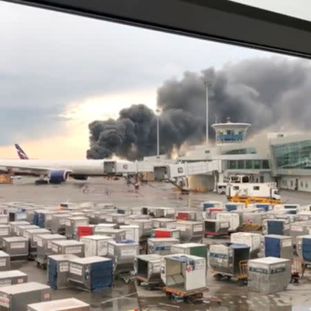 A still image taken from a video obtained by social media, shows smoke billowing after an incident of an Aeroflot Sukhoi Superjet 100 passenger plane at Moscow's Sheremetyevo airport, Russia May 5, 2019. INSTAGRAM/@BIORAVEN911/via REUTERS