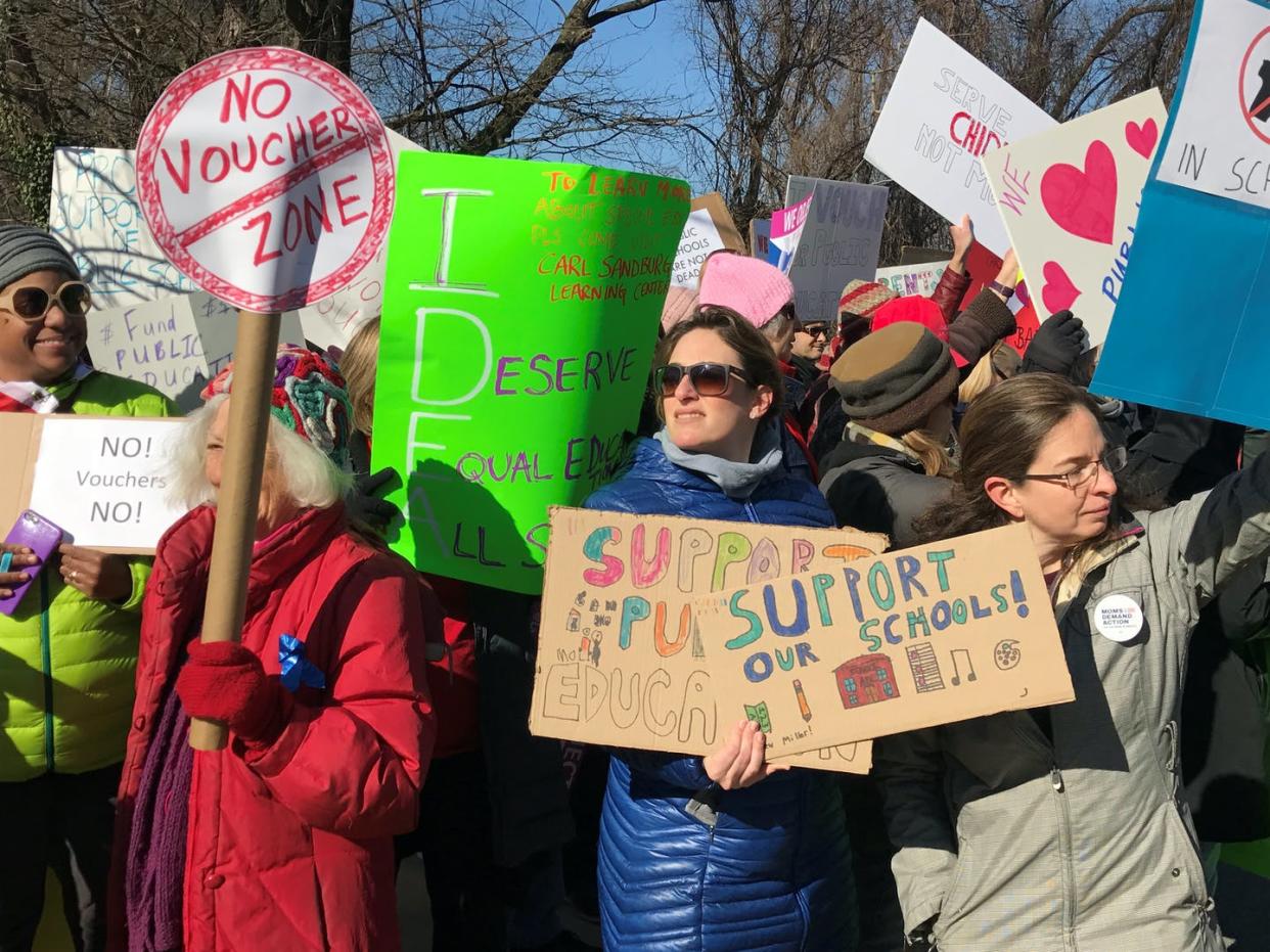 <span class="caption">Protesters gather as Education Secretary Betsy DeVos visits a school in Maryland.</span> <span class="attribution"><a class="link " href="https://www.gettyimages.com/detail/news-photo/large-group-of-protesters-gather-after-devos-enters-the-news-photo/657150080?adppopup=true" rel="nofollow noopener" target="_blank" data-ylk="slk:Sarah L. Voisin/The Washington Post via Getty Images;elm:context_link;itc:0;sec:content-canvas">Sarah L. Voisin/The Washington Post via Getty Images</a></span>