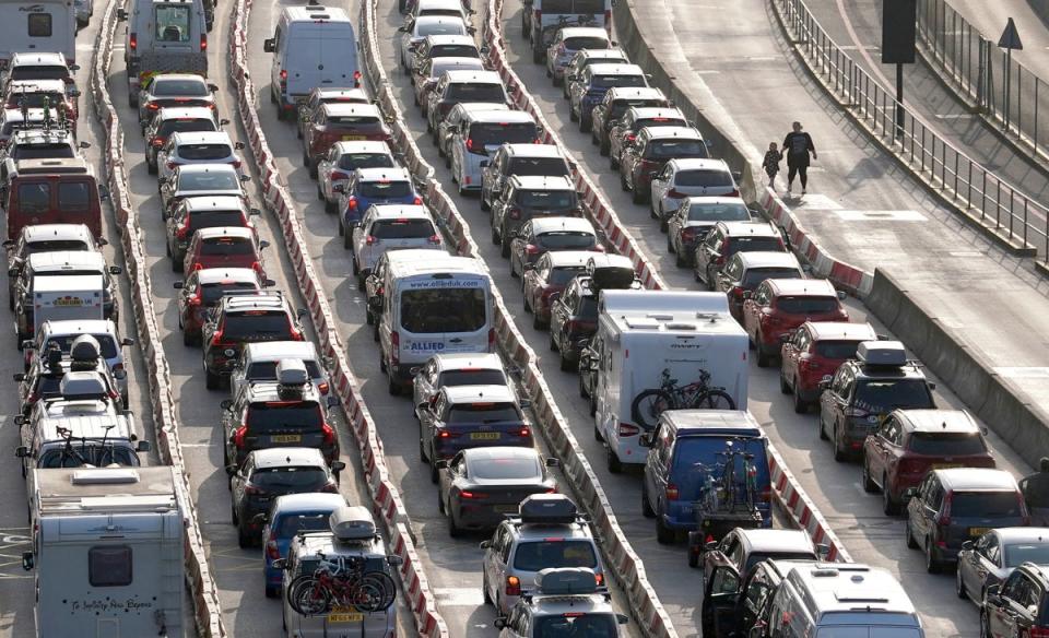 Passengers queue for ferries at the Port of Dover in Kent as the getaway for half term and the bank holiday weekend continues (PA)