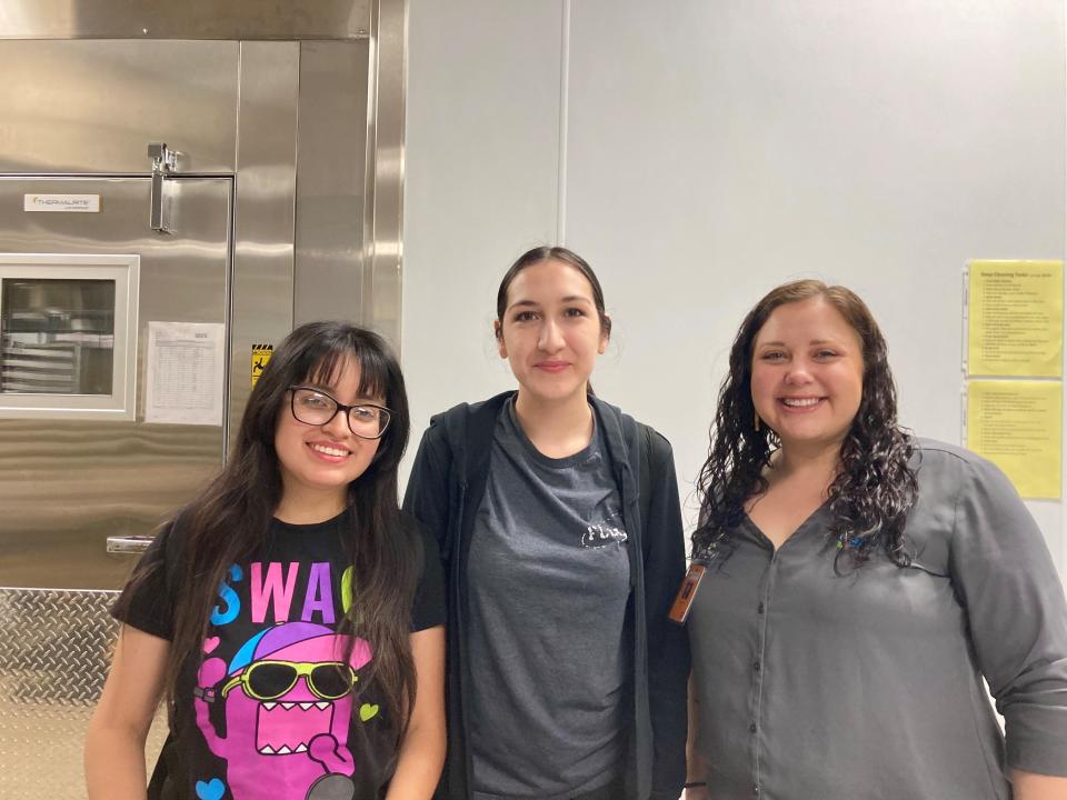 From left: Pueblo East High School Senior Jennifer Hernandez, 11th grader Yasmin Venzor and Savannah Box, the director of operations for the district's food service program.