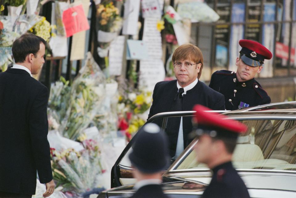 A picture of Elton John arriving at the funeral service of Diana, Princess of Wales in 1997.