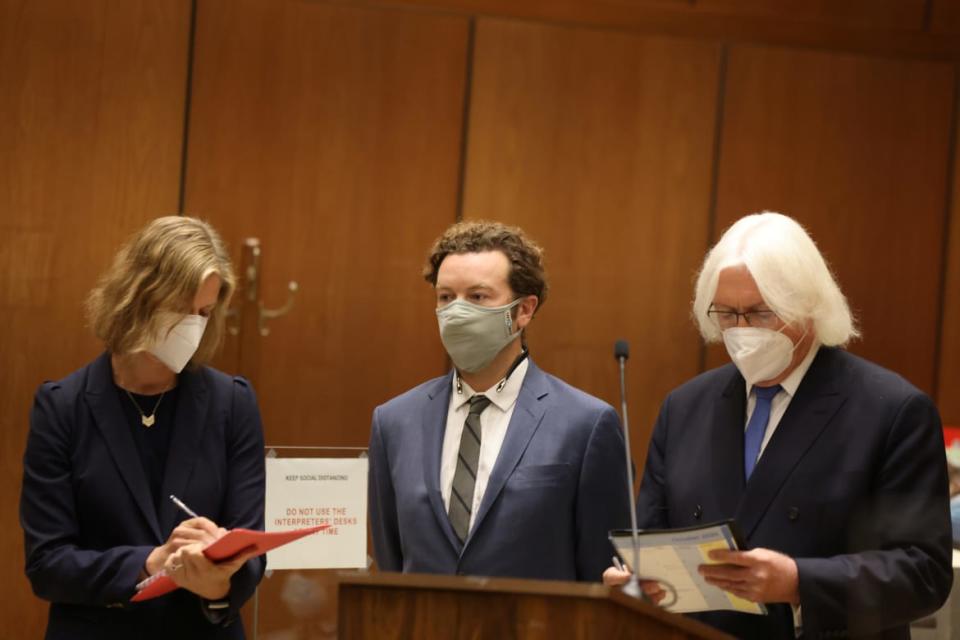 Actor Danny Masterson stands with his lawyers Thomas Mesereau and Sharon Appelbaum in 2020