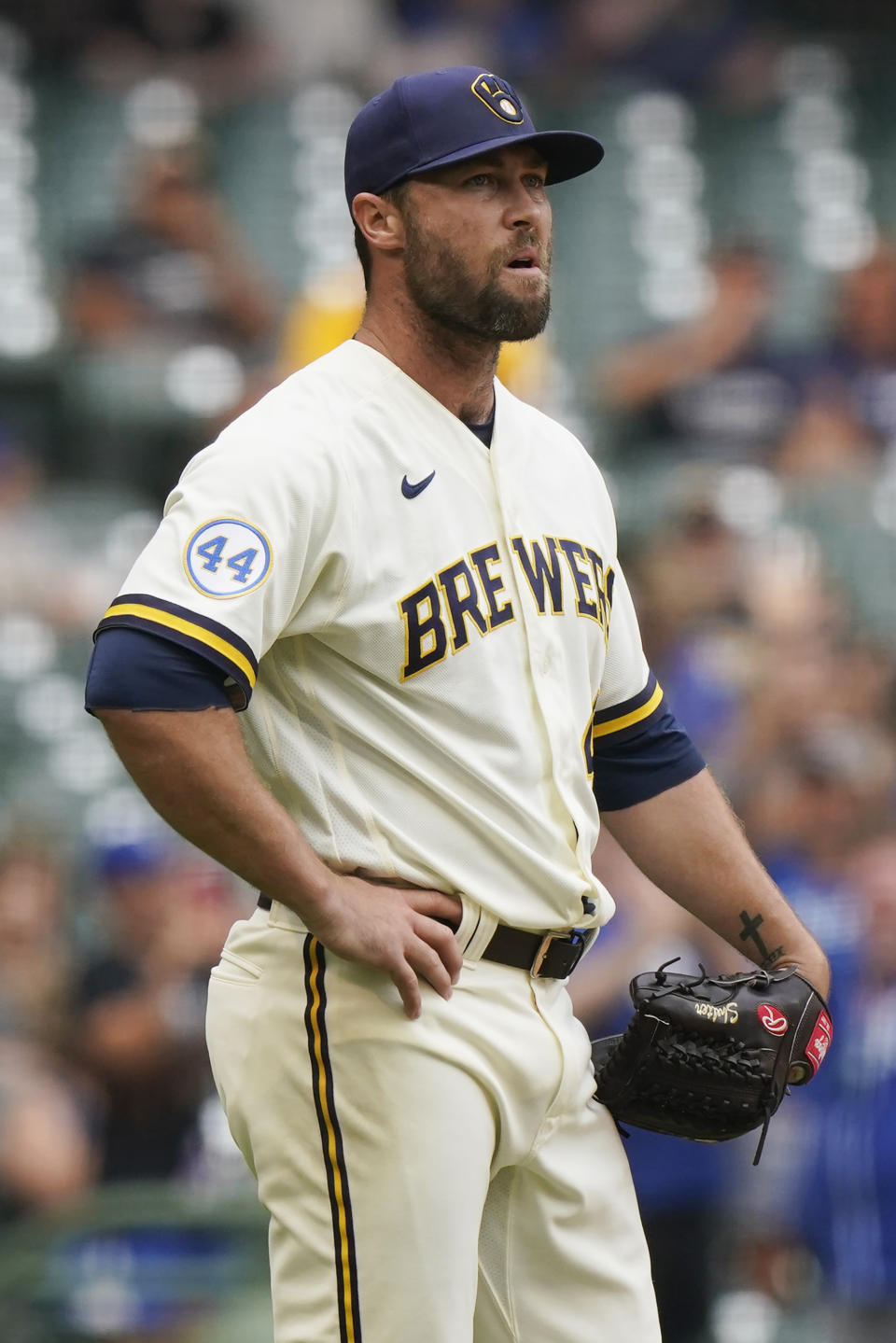 Milwaukee Brewers relief pitcher Hunter Strickland pauses after Kansas City Royals' Ryan O'Hearn hit a two-run home run during the seventh inning of a baseball game Tuesday, July 20, 2021, in Milwaukee. (AP Photo/Nam Y. Huh)