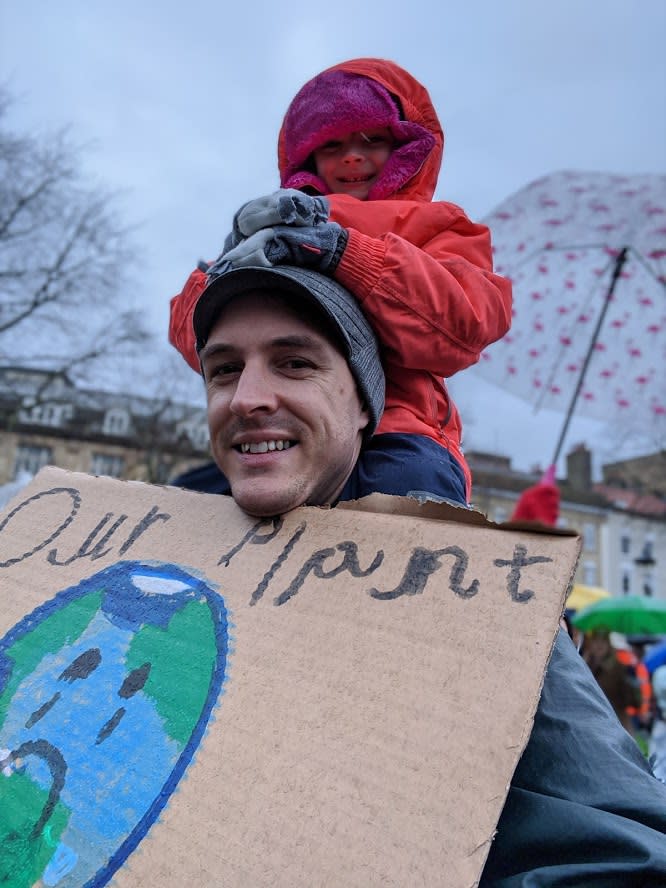 Jon Usher and his five-year-old daughter at Friday's climate march (Jon Usher)