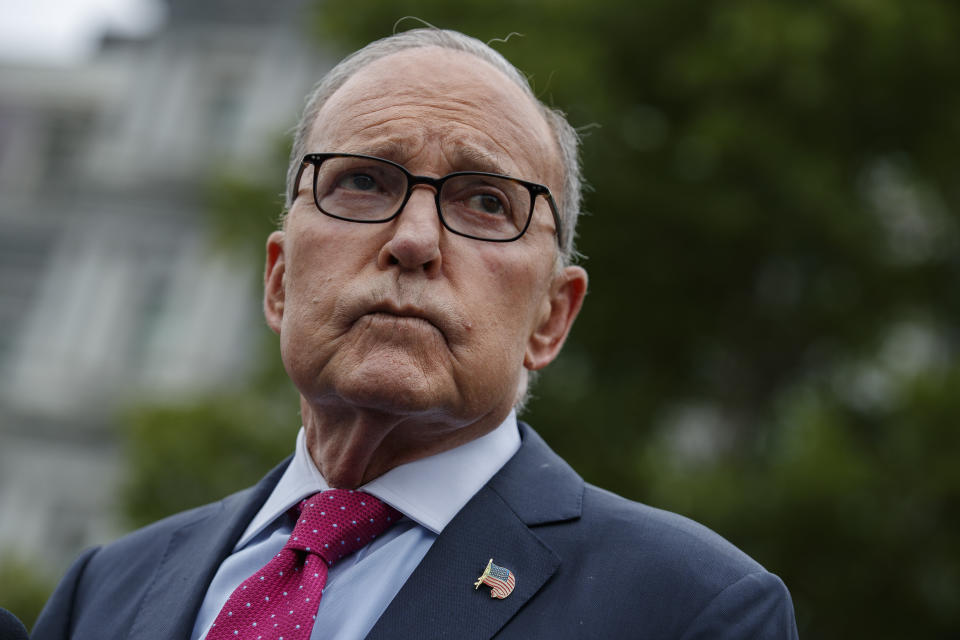 White House chief economic adviser Larry Kudlow talks with reporters outside the White House, Friday, Sept. 6, 2019, in Washington. (AP Photo/Evan Vucci)