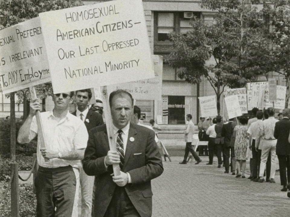 Frank Kameny leads a picket line holding a sign in front of Independence Hall in Philadelphia on July 4, 1965.