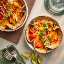 <p>These savory breakfast bowls make excellent use of the air fryer. The tortilla is the perfect vehicle for scooping up the egg, pepper and tomato filling—plus it can soak up the runny egg yolk. Lime juice adds brightness to finish the dish. <a href="https://www.eatingwell.com/recipe/8025802/air-fryer-breakfast-bowl/" rel="nofollow noopener" target="_blank" data-ylk="slk:View Recipe;elm:context_link;itc:0;sec:content-canvas" class="link ">View Recipe</a></p>