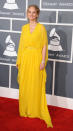 <b>Joan Osborne</b><br> <b>Grade: C+</b><br> "One of Us" singer Joan Osborne – nominated for Best Blues Album – brightened up the arrivals line in a yellow butterfly sleeve chiffon gown by Rani Zakhem.