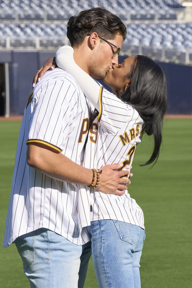 ABC/Charity had fun hanging out and kissing Brayden at the baseball stadium.