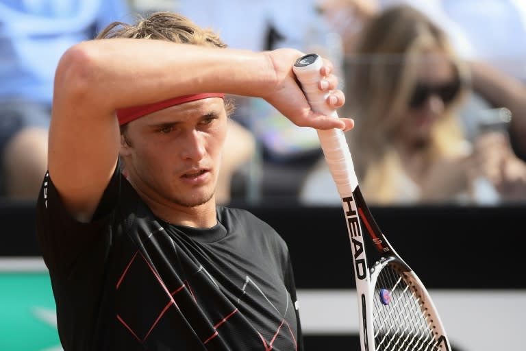 Feel the strain: Alexander Zverev was three games from victory before Nadal hit back