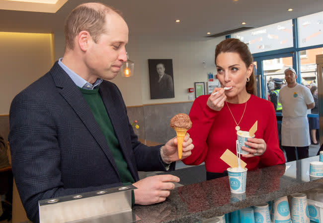 william studying an ice cream cone as kate watches