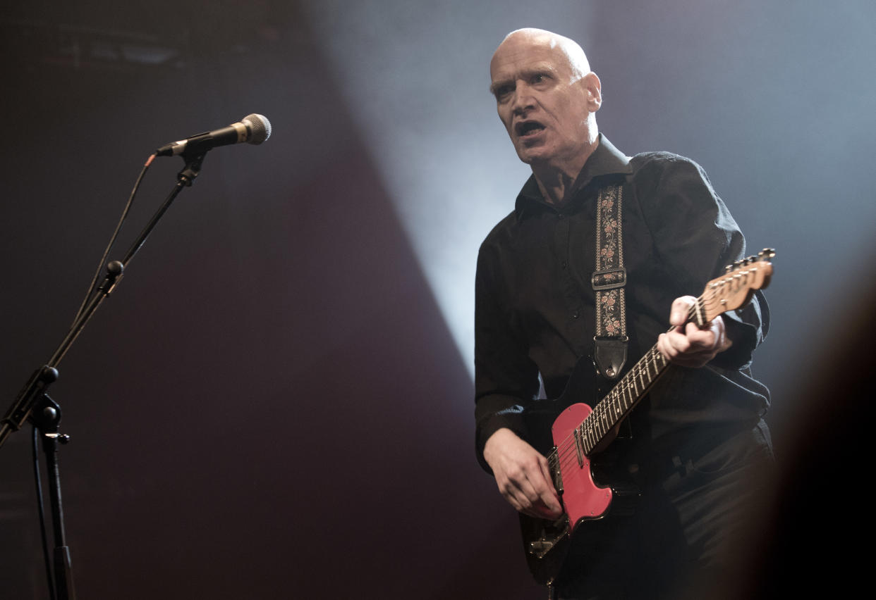 Wilko Johnson, guitarist and founding member of Dr. Feelgood, performs one of four farewell concerts in the UK, at the Koko club in north London, Wednesday, Mar. 6, 2013, following his announcement that he has been diagnosed with terminal cancer of the pancreas and has chosen not to undergo chemotherapy. (Photo by Joel Ryan/Invision/AP)